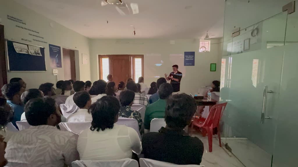 Live seminar session with instructor presenting to internship batch